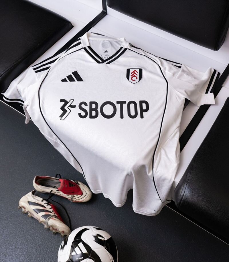 white fulham home kit with black details